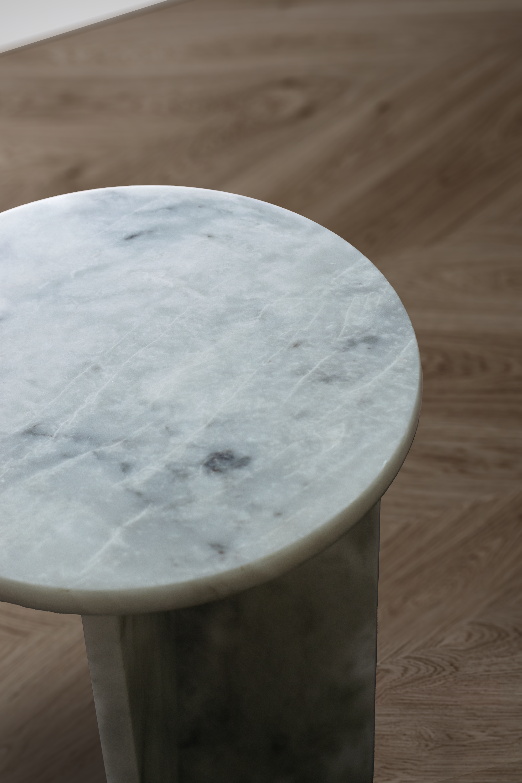 Elegant Zhob Accent Table in White Marble with a polished surface and subtle veining.
