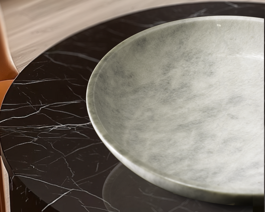 Luxurious white marble bowl featuring a classic round shape, ideal for enhancing home décor.