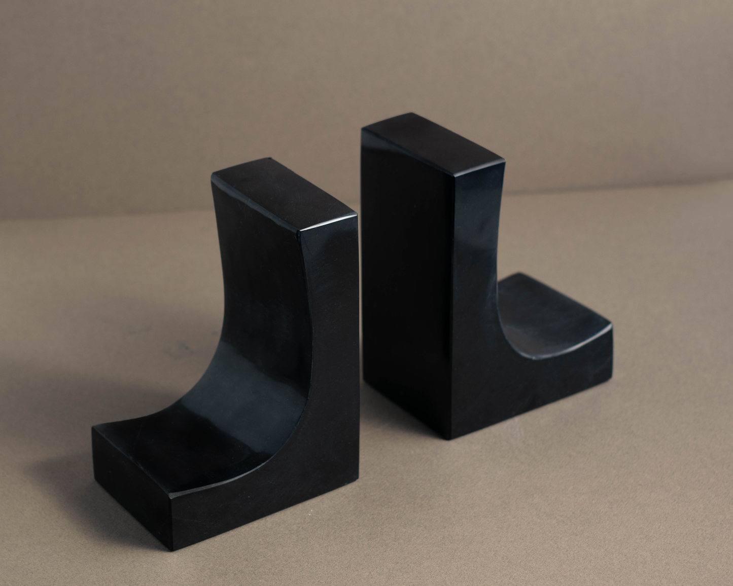 Unique Ascend Black Marble Bookends with handcrafted design and natural veining for modern décor.