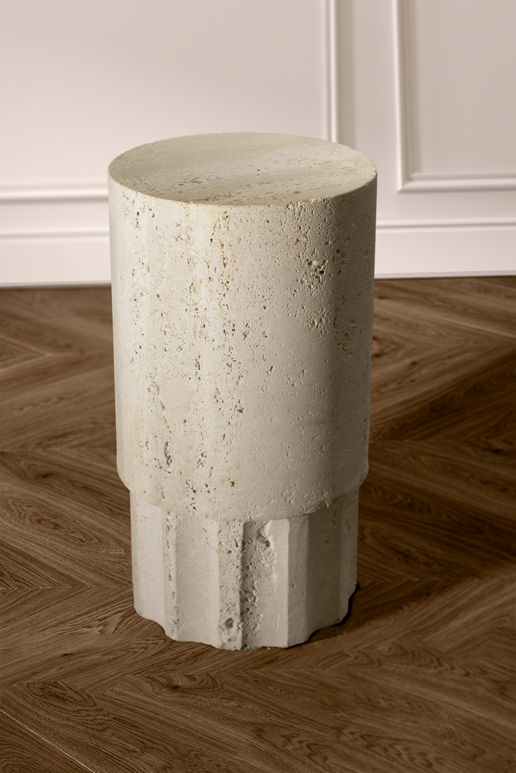 "Heritage side table in travertine with a round top and handcrafted column base."