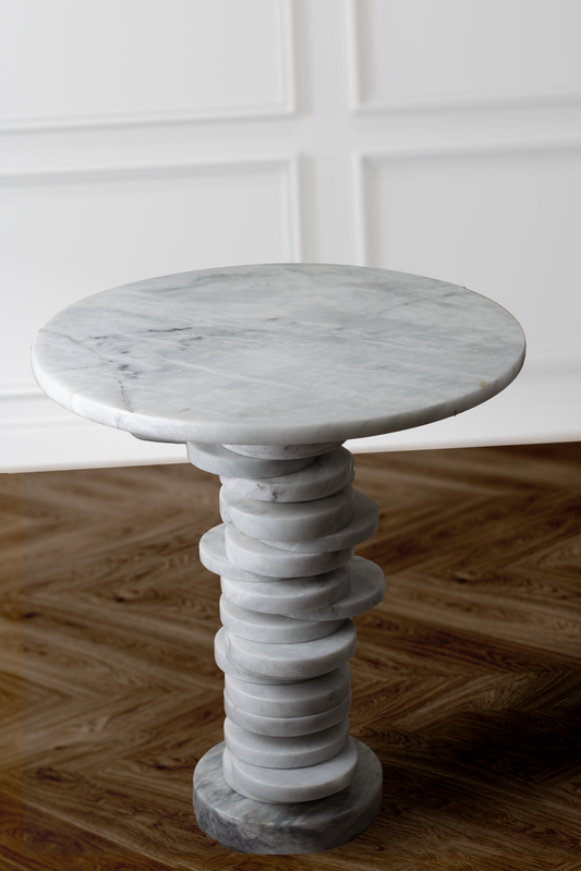 Artistic white marble table featuring a mosaic arrangement, combining classic charm with contemporary elegance.