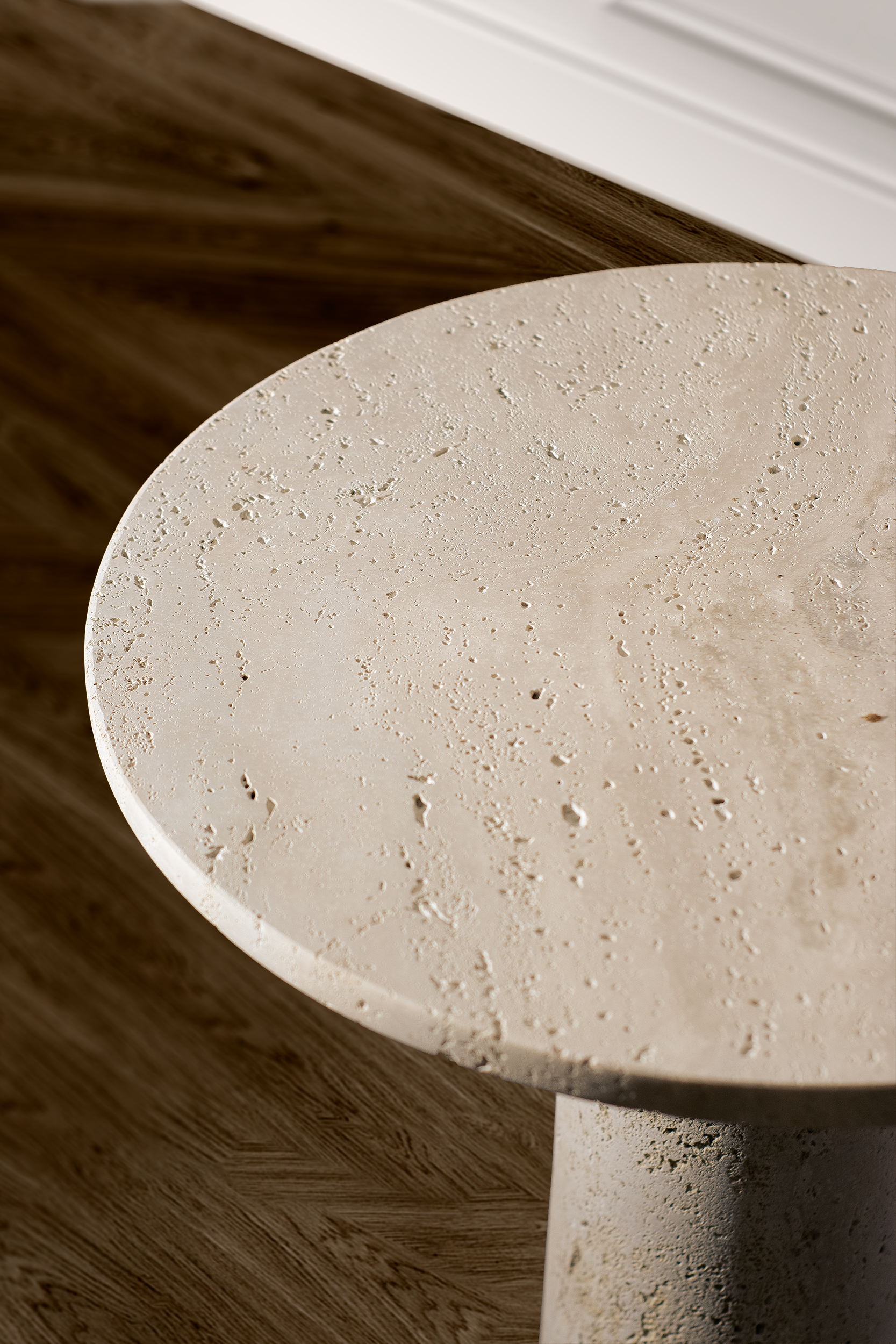 Handcrafted travertine accent table with a bold cone base and smooth rounded top, perfect for any room.