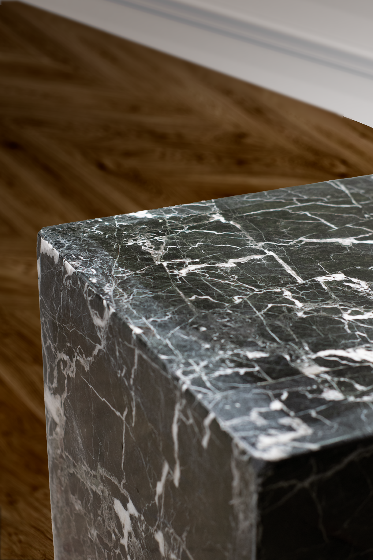 Elegant black marble cube accent table with unique veining, ideal for modern interiors and upscale home decor.