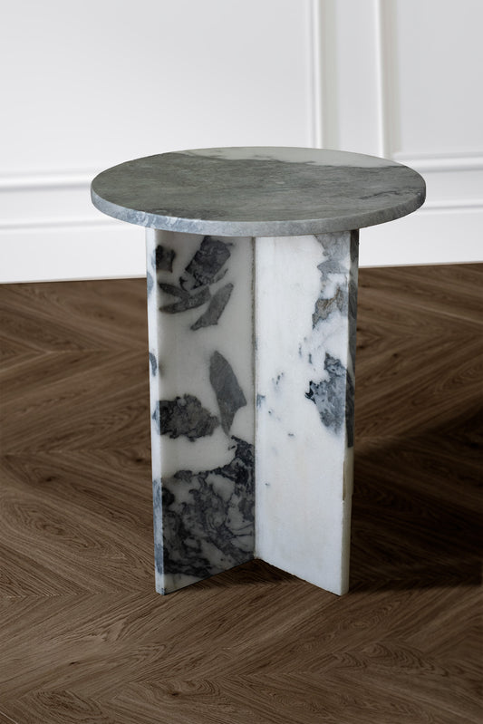 Sibi Accent Table in white marble featuring dark grey veins, showcasing its elegant design.
