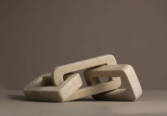 Handmade Marble Links in Travertine, showcasing elegant design and natural veining, perfect for enhancing home decor.