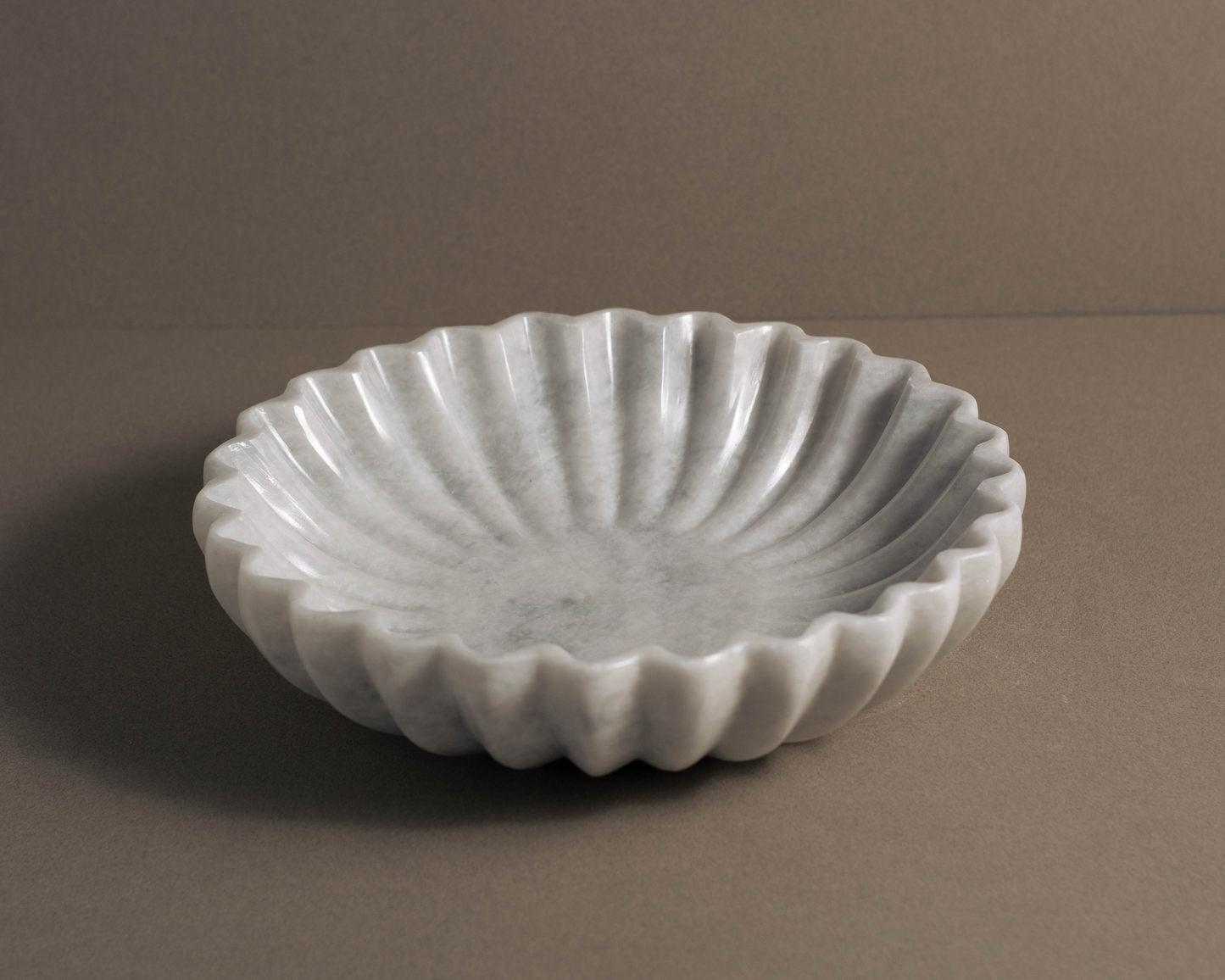 Artisan Marble Coral Bowl, a luxurious decorative piece with natural stone patterns and a sophisticated look.