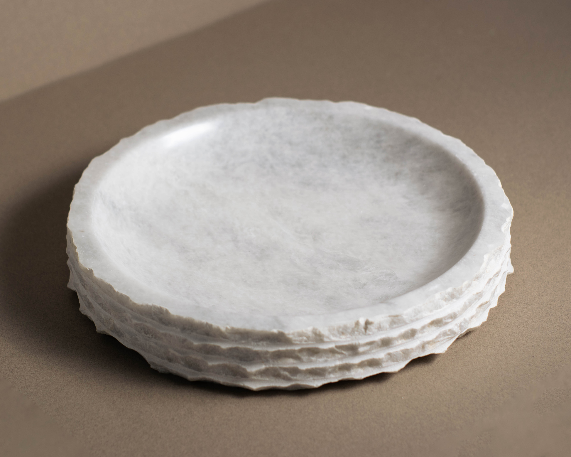 Luxurious white marble bowl, hand-carved for use as a centerpiece or serving dish.