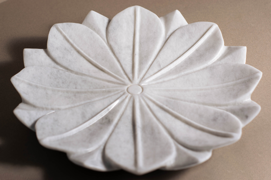 Unique lotus-inspired design of the White Marble Charger Plate, perfect for enhancing dining arrangements.