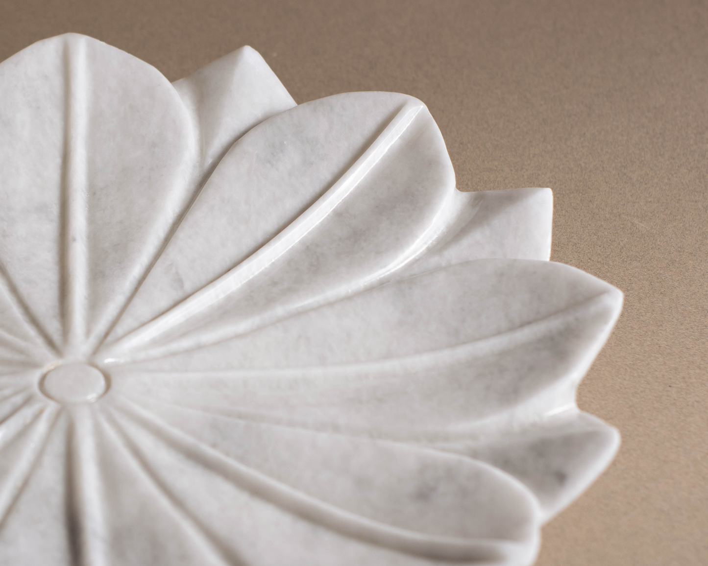 Elegant Handmade Lotus Charger Plate in White Marble with smooth, polished surface and subtle veining.