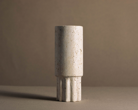 Beautifully crafted Travertine Column Vase showcasing natural veining and intricate details.
